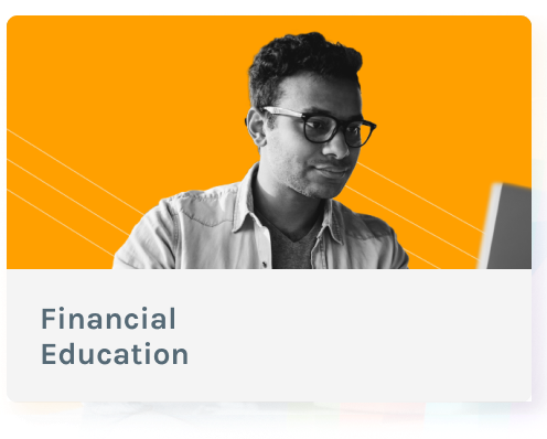 A person wearing glasses looks at a computer screen with the text Financial Education displayed below on a gray banner. A person wearing glasses looks at a computer screen with the text Financial Education displayed below on a gray banner.